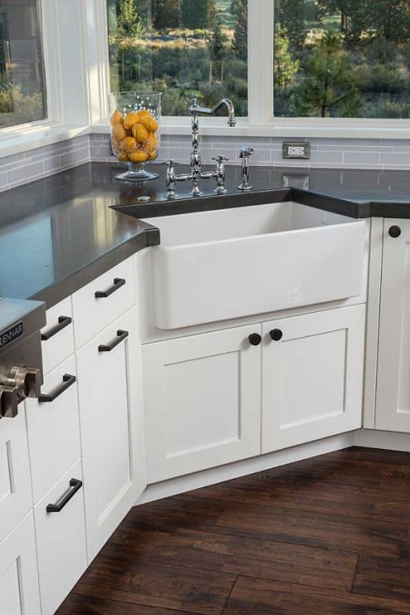 White Kitchen with wood flooring